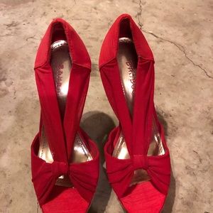 4 to 5 inch heels.  Many worn once.